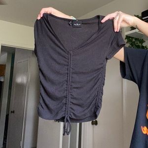 black cinch v-neck top